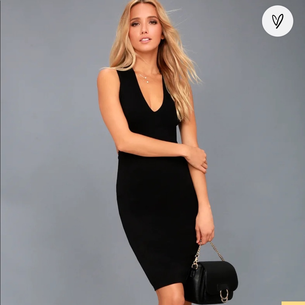 Lulu’s black cocktail dress. Crisscross back. Size Large